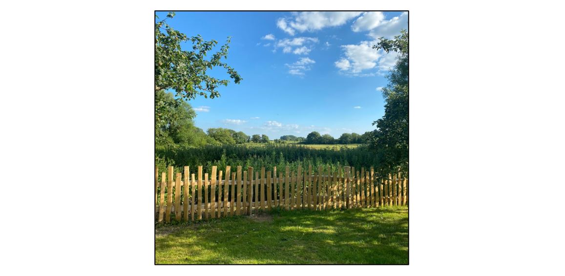 The Heritage Orchard at Stapleford Granary - Fields and Picket Fence